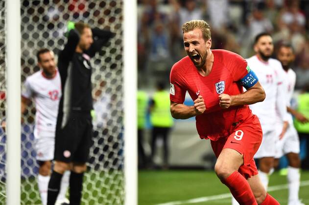 Harry Kane of England celebrates after scoring his second goal against Tunisia in their Group G match during the 2018 FIFA World Cup WM Weltmeisterschaft Fussball in Volgograd, Russia, 18 June 2018. Harry Kane fired an injury time winner as he scored twice to earn England a 2-1 win over Tunisia in their World Cup opener. England got off to a quick start in Volgograd as Kane opened his account after just 11 minutes, tapping home after Tunisian goalkeeper Mouez Hassen pulled off an acrobatic save to deny John Stones. The Three Lions kicked into gear and came close several times, with Raheem Sterling missing a sitter and Hassen pulling off another stunning stop to prevent Jesse Lingard putting England two ahead. But Tunisia were gifted a way back into the game on 35 minutes, as Kyle Walker caught Ben Youssef with an arm in the England box and gave away a penalty. The Three Lions were dominant in possession but at times laboured under the pressure of the occasion, failing to break down Tunisia as the African side defended in numbers. Harry Kane scores late winner to give England 2-1 victory over Tunisia in World Cup opener 20180619_02759