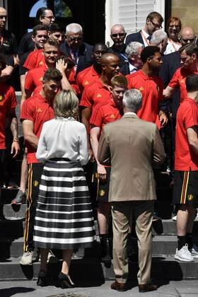 Queen Mathilde of Belgium, King Philippe - Filip of Belgium talk with, Belgium s Thomas Meunier and Belgium s Kevin De Bruyne at the Royal castle in Laken - Laeken, as Belgian national soccer team Red Devils are received by Royal couple after the presence in the semi-final of the soccer World cup in Russia, Sunday 15 July 2018. ERICxLALMAND x05386497x