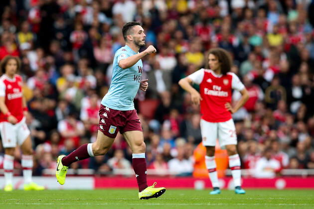 John McGinn of Aston Villa celebrates scoring the first goal of the game during the Premier League match at the Emirates Stadium, London. Picture date: 22nd September 2019. Picture credit should read: James Wilson Sportimage EDITORIAL USE ONLY. No use with unauthorised audio, video, data, fixture lists, club league logos or live services. Online in-match use limited to 120 images, no video emulation. No use in betting, games or single club league player publications. SPI-0217-0012