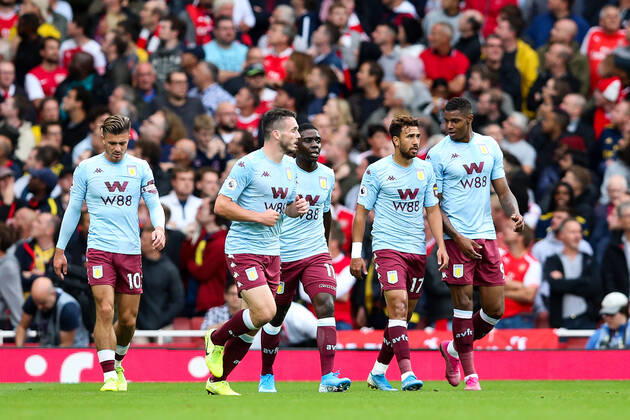 John McGinn of Aston Villa celebrates scoring the first goal of the game during the Premier League match at the Emirates Stadium, London. Picture date: 22nd September 2019. Picture credit should read: James Wilson Sportimage EDITORIAL USE ONLY. No use with unauthorised audio, video, data, fixture lists, club league logos or live services. Online in-match use limited to 120 images, no video emulation. No use in betting, games or single club league player publications. SPI-0217-0014