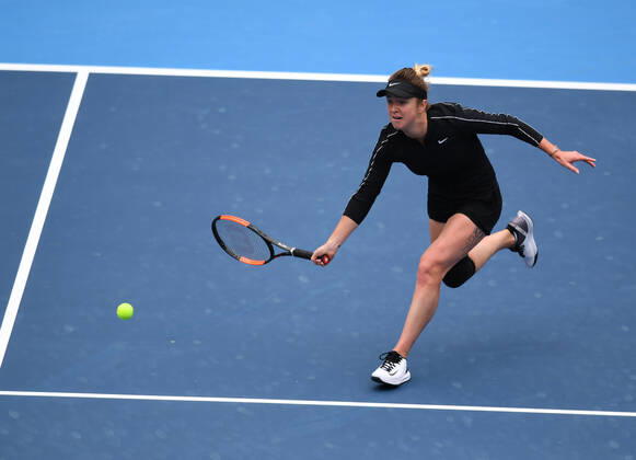 (191004) -- BEIJING, Oct. 4, 2019 -- Elina Svitolina of Ukraine hits a return during the women s singles quarterfinal match against Kiki Bertens of the Netherlands at 2019 China Open tennis tournament in Beijing, capital of China, Oct. 4, 2019. ) (SP)CHINA-BEIJING-TENNIS-CHINA OPEN-WOMEN S SINGLES(CN) LixYibo
