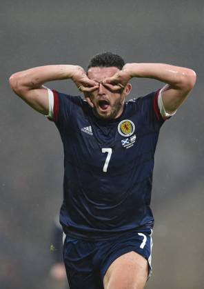 Glasgow, Scotland, 9th October 2021. John McGinn of Scotland scores ScotlandÕs 1st goal during the FIFA World Cup, WM, Weltmeisterschaft, Fussball qualifiers match at Hampden Park, Glasgow. Picture credit should read: Neil Hanna Sportimage EDITORIAL USE ONLY. No use with unauthorised audio, video, data, fixture lists, club league logos or live services. Online in-match use limited to 120 images, no video emulation. No use in betting, games or single club league player publications. SPI-1226-0048
