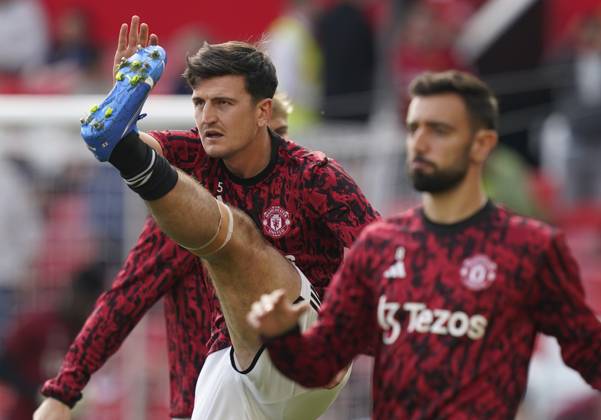 MANCHESTER, ENGLAND, 7th October 2023. Harry Maguire of Manchester United, ManU warms up before the Premier League match at Old Trafford, MANCHESTER. Picture credit should read: Andrew Yates Sportimage EDITORIAL USE ONLY. No use with unauthorised audio, video, data, fixture lists, club league logos or live services. Online in-match use limited to 120 images, no video emulation. No use in betting, games or single club league player publications. SPI-2635-0006