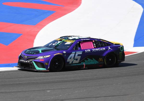 CHARLOTTE, NC - OCTOBER 07: Tyler Reddick ( 45 23XI Racing Jordan Brand Toyota) races through Turn 4 during practice for the NASCAR, Motorsport, USA Cup Series Playoff Bank of America ROVAL 400 on October 07, 2023, at Charlotte Motor Speedway in Concord, NC. (Photo by Jeffrey Vest Icon Sportswire) AUTO: OCT 07 NASCAR Cup Series Playoff Bank of America ROVAL 400 EDITORIAL USE ONLY Icon231007841