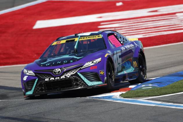 CHARLOTTE, NC - OCTOBER 08: Tyler Reddick ( 45 23XI Racing Jordan Brand Toyota) exits turn 18 during the running of the NASCAR, Motorsport, USA Cup Series Playoff Bank of America ROVAL 400 on October 8, 2023, at Charlotte Motor Speedway in Charlotte, NC. (Photo by Jeff Robinson Icon Sportswire) AUTO: OCT 08 NASCAR Cup Series Playoff Bank of America ROVAL 400 EDITORIAL USE ONLY Icon231008922400