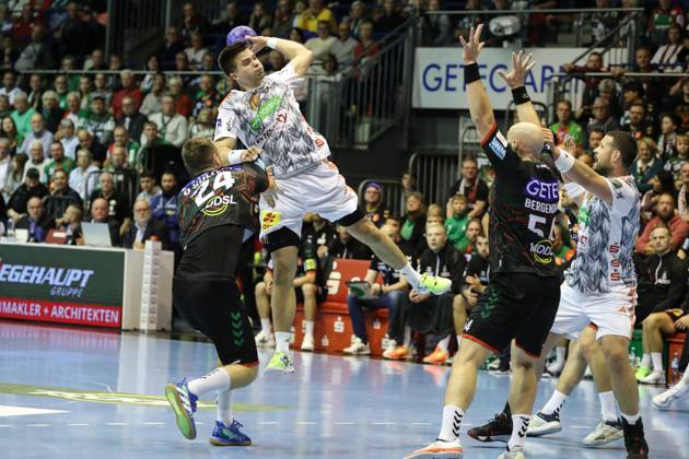 Renars Uscins (TSV Hannover-Burgdorf,10) - Handball Bundesliga Saison 2023-2024 SC Magdeburg vs. TSV Hannover-Burgdorf in der GETEC Arena in Magdeburg - Aktion,Handball,Deutschland,15.10.2023