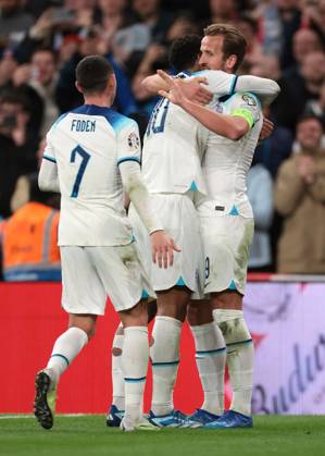 London, England, 17th October 2023. Harry Kane of England celebrates with team mates Jude Bellingham and Phil Foden after scoring to give the side a 3-1 lead the UEFA European Championship, EM, Europameisterschaft Qualifying match at Wembley Stadium, London. Picture credit should read: Jonathan Moscrop Sportimage EDITORIAL USE ONLY. No use with unauthorised audio, video, data, fixture lists, club league logos or live services. Online in-match use limited to 120 images, no video emulation. No use in betting, games or single club league player publications. SPI-2650-0043