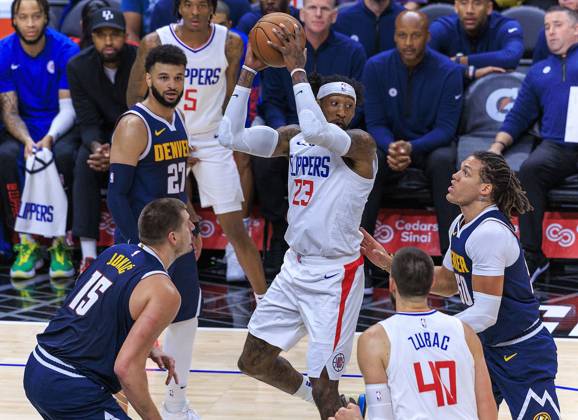 October 19, 2023, Los Angeles, California, USA: Robert Covington 23 of the Los Angeles Clippers passes the ball during their preseason NBA, Basketball Herren, USA game against the Denver Nuggets on Thursday October 19, 2023 at Crypto.com Arena in Los Angeles, California. Clippers lose to Nuggets, 90-103. ARIANA RUIZ PI Los Angeles USA - ZUMAp124 20231019_zaa_p124_025 Copyright: xArianaxRuizx