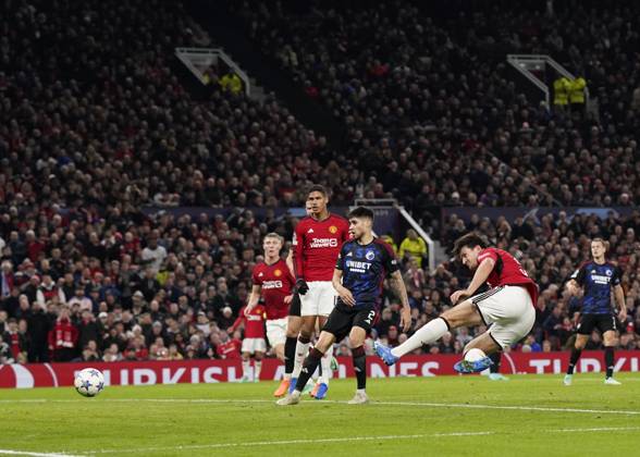 Manchester, England, 24th October 2023. Harry Maguire of Manchester United, ManU scores the first goal during the UEFA Champions League match at Old Trafford, Manchester. Picture credit should read: Andrew Yates Sportimage EDITORIAL USE ONLY. No use with unauthorised audio, video, data, fixture lists, club league logos or live services. Online in-match use limited to 120 images, no video emulation. No use in betting, games or single club league player publications. SPI-2672-0083