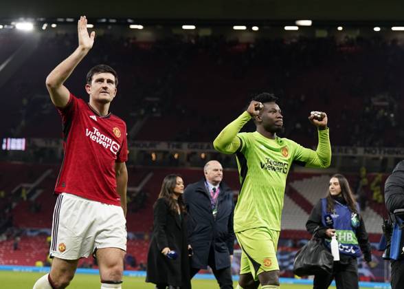 Manchester, England, 24th October 2023. Harry Maguire of Manchester United, ManU and Andrà Onana of Manchester United take the acclaim during the UEFA Champions League match at Old Trafford, Manchester. Picture credit should read: Andrew Yates Sportimage EDITORIAL USE ONLY. No use with unauthorised audio, video, data, fixture lists, club league logos or live services. Online in-match use limited to 120 images, no video emulation. No use in betting, games or single club league player publications. SPI-2672-0094
