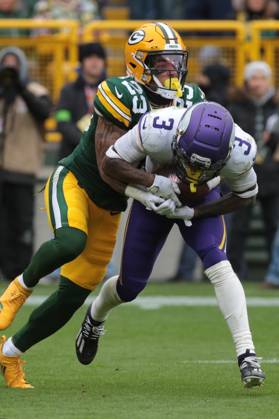 GREEN BAY, WI - OCTOBER 29: Green Bay Packers cornerback Jaire Alexander (23) tackles Minnesota Vikings wide receiver Jordan Addison (3) during a game between the Green Bay Packers and the Minnesota Vikings on October 29, 2023 at Lambeau Field, in Green Bay, WI. (Photo by Larry Radloff Icon Sportswire) NFL, American Football Herren, USA OCT 29 Vikings at Packers EDITORIAL USE ONLY Icon2310291382