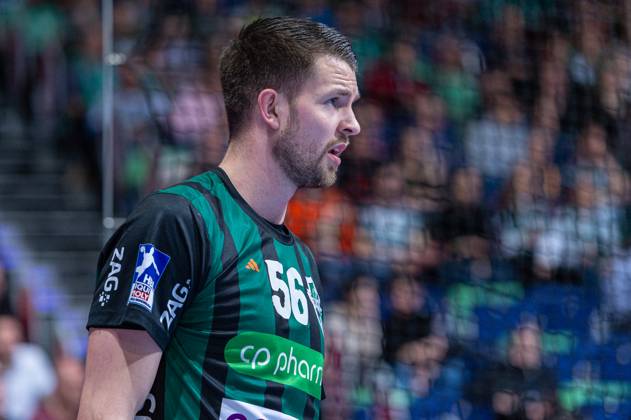 Hannes Feise (TSV Hannover-Burgdorf, Nr. 56) (v.l.), TSV Hannover-Burgdorf (grün) gegen TVB Stuttgart (blau) am 24. Spieltag der Saison 2023 2024 in der LIQUI MOLY Handball-Bundesliga (29.02.2024, ZAG Arena (Hannover, GER), Copyright: xJanxGuentherx xTSVxHannover-Burgdorfx