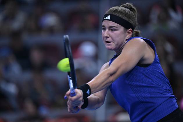 (241006) -- BEIJING, Oct. 6, 2024 -- Karolina Muchova of the Czech Republic hits a return during the women s singles final match against Coco Gauff of the United States at the 2024 China Open tennis tournament in Beijing, China, Oct. 6, 2024. ) (SP)CHINA-BEIJING-TENNIS-CHINA OPEN-WOMEN S SINGLES-FINAL (CN) ZhangxLong