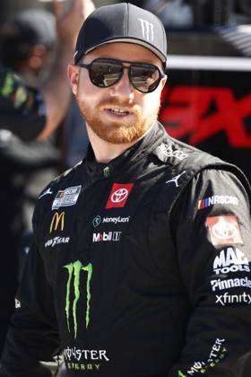 CHARLOTTE, NC - OCTOBER 12: Tyler Reddick ( 45 23XI Racing Monster Energy Toyota) talks with members of his crew during practice for the NASCAR, Motorsport, USA Cup Series Bank of America ROVAL 400 on October 12, 2024 at Charlotte Motor Speedway in Charlotte, NC. (Photo by Jeff Robinson Icon Sportswire) AUTO: OCT 12 NASCAR Cup Series Bank of America ROVAL 400 EDITORIAL USE ONLY Icon2410122399400