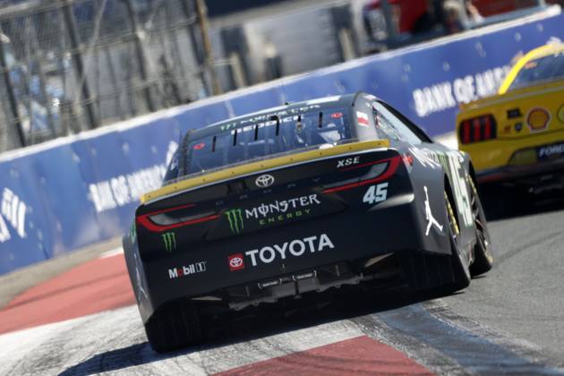 CHARLOTTE, NC - OCTOBER 12: Tyler Reddick ( 45 23XI Racing Monster Energy Toyota) exits turn 3 during qualifying for the NASCAR, Motorsport, USA Cup Series Bank of America ROVAL 400 on October 12, 2024 at Charlotte Motor Speedway in Charlotte, NC. (Photo by Jeff Robinson Icon Sportswire) AUTO: OCT 12 NASCAR Cup Series Bank of America ROVAL 400 EDITORIAL USE ONLY Icon2410122901400