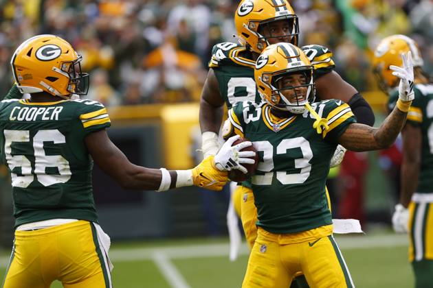 GREEN BAY, WI - OCTOBER 13: Green Bay Packers cornerback Jaire Alexander (23) celebrates his fumble recovery during a game between the Green Bay Packers and the Arizona Cardinals at Lambeau Field on October 13, 2024 in Green Bay, WI. (Photo by Larry Radloff Icon Sportswire) NFL, American Football Herren, USA OCT 13 Cardinals at Packers EDITORIAL USE ONLY Icon02410135244