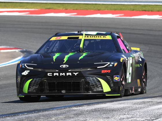 CHARLOTTE, NC - OCTOBER 13: Tyler Reddick ( 45 23XI Racing Monster Energy Toyota) races off Turn 5 during the running of the NASCAR, Motorsport, USA Cup Series Bank of America ROVAL 400 on October 13, 2024, at Charlotte Motor Speedway in Concord, NC. (Photo by Jeffrey Vest Icon Sportswire) AUTO: OCT 13 NASCAR Cup Series Bank of America ROVAL 400 EDITORIAL USE ONLY Icon241013704