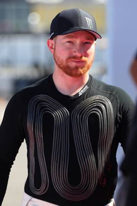 CHARLOTTE, NC - OCTOBER 13: Tyler Reddick ( 45 23XI Racing Monster Energy Toyota) walks to the pre-race stage prior to the running of the NASCAR, Motorsport, USA Cup Series Bank of America ROVAL 400 on October 13, 2024 at Charlotte Motor Speedway in Charlotte, NC. (Photo by Jeff Robinson Icon Sportswire) AUTO: OCT 13 NASCAR Cup Series Bank of America ROVAL 400 EDITORIAL USE ONLY Icon2410132548400