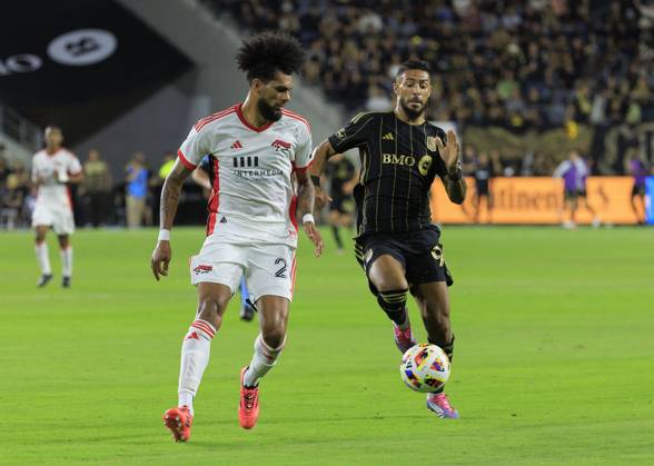 October 19, 2024, Los Angeles, California, USA: Denis Bouanga 99 of the Los Angeles Football Club is defended by Rodrigues 26 of the San Jose Earthquakes during their regular season MLS, Fussball Herren, USA match on Saturday October 19, 2024 at the BMO Stadium in Los Angeles, California. LAFC defeats Earthquakes, 3-1. JAVIER ROJAS PI Los Angeles USA - ZUMAp124 20241019_zaa_p124_053 Copyright: xJavierxRojasx