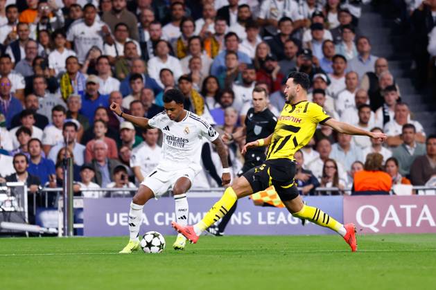 October 22, 2024, Madrid, Madrid, SPAIN: Rodrygo Goes of Real Madrid and Ramy Bensebaini of Borussia Dortmund in action during the UEFA Champions League 2024 25 League Phase MD3 match between Real Madrid CF and Borussia Dortmund at Estadio Santiago Bernabeu on October 22, 2024, in Madrid, Spain. Madrid SPAIN - ZUMAa181 20241022_zaa_a181_188 Copyright: xDennisxAgyemanx