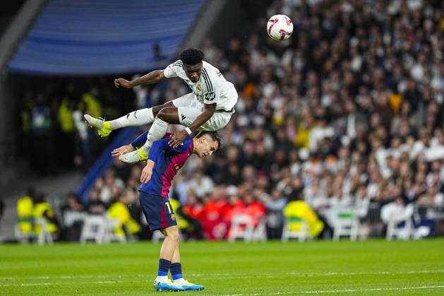 October 26, 2024, Madrid, Madrid, SPAIN: Aurelien Tchouameni of Real Madrid and Marc Casado of FC Barcelona, Barca in action during the Spanish league, La Liga EA Sports, football match played between Real Madrid and FC Barcelona at Santiago Bernabeu stadium on October 26, 2024, in Madrid, Spain. Madrid SPAIN - ZUMAa181 20241026_zaa_a181_220 Copyright: xOscarxJxBarrosox