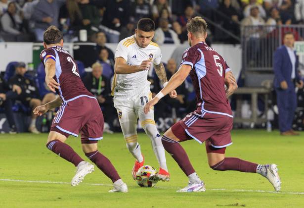 October 26, 2024, Los Angeles, California, USA: Gabriel Pec 11 of the LA Galaxy is defended by Keegan Rosenberry 2 and Andreas Maxso 5 of the Colorado Rapids during the Audi 2024 MLS, Fussball Herren, USA Cup Playoffs Round One Game 1 of 3 on Saturday October 26, 2024 at Dignity Health Sports Park Stadium in Carson, California. The Galaxy defeats Rapids, 5-0. JAVIER ROJAS PI Los Angeles USA - ZUMAp124 20241026_zaa_p124_055 Copyright: xJavierxRojasx