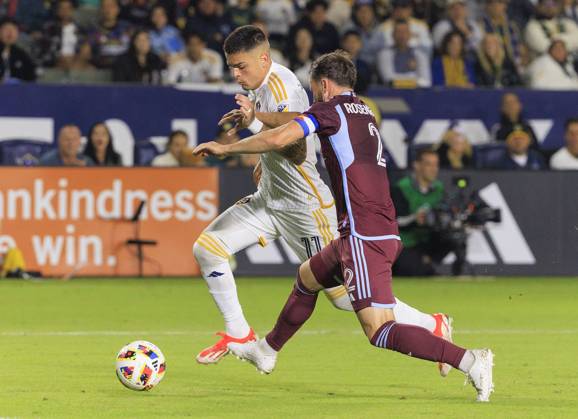 October 26, 2024, Los Angeles, California, USA: Gabriel Pec 11 of the LA Galaxy is defended by Keegan Rosenberry 2 of the Colorado Rapids during the Audi 2024 MLS, Fussball Herren, USA Cup Playoffs Round One Game 1 of 3 on Saturday October 26, 2024 at Dignity Health Sports Park Stadium in Carson, California. The Galaxy defeats Rapids, 5-0. JAVIER ROJAS PI Los Angeles USA - ZUMAp124 20241026_zaa_p124_056 Copyright: xJavierxRojasx
