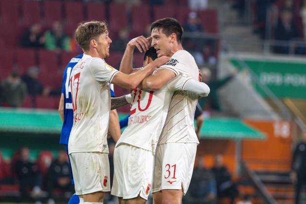 Torjubel, jubelt nach seinem Treffer zum 1:0 von Kristijan JakiÄ‡ (FC Augsburg), Torschuezte Alexis Claude-Maurice (FC Augsburg) und Keven Schlotterbeck (FC Augsburg) v-l, FC Augsburg vs. FC FC Schalke 04, Fussball, DFB-Pokal, 2. Runde, 29.10.2024 DFB regulations prohibit any use of photographs as image sequences and or quasi-video Augsburg Bayern Deutschland