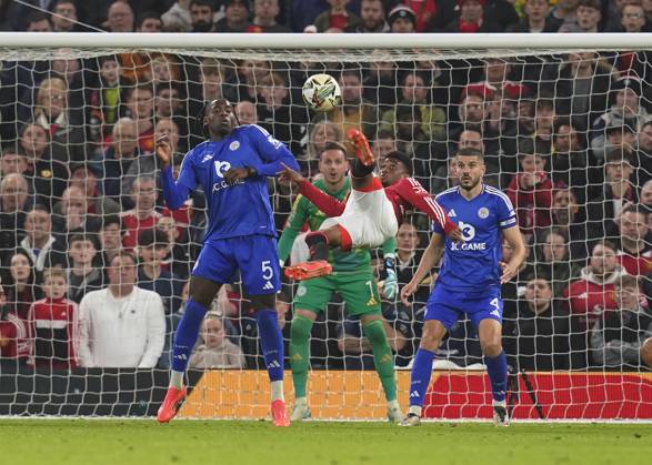 Manchester, England, 30th October 2024. Amad Diallo of Manchester United, ManU shoots wide with an over head kick during the Carabao Cup match at Old Trafford, Manchester. Picture credit should read: Andrew Yates Sportimage EDITORIAL USE ONLY. No use with unauthorised audio, video, data, fixture lists, club league logos or live services. Online in-match use limited to 120 images, no video emulation. No use in betting, games or single club league player publications. SPI-3418-0048