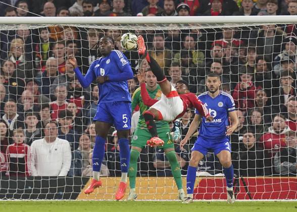 Manchester, England, 30th October 2024. Amad Diallo of Manchester United, ManU shoots wide with an over head kick during the Carabao Cup match at Old Trafford, Manchester. Picture credit should read: Andrew Yates Sportimage EDITORIAL USE ONLY. No use with unauthorised audio, video, data, fixture lists, club league logos or live services. Online in-match use limited to 120 images, no video emulation. No use in betting, games or single club league player publications. SPI-3418-0050
