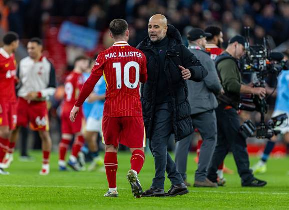 Football - FA Premier League - Liverpool FC v Manchester City FC LIVERPOOL, ENGLAND - Sunday, December 1, 2024: Manchester City s manager Josep Pep Guardiola (R) shakes hands with Liverpool s Alexis Mac Allister after the FA Premier League match between Liverpool FC and Manchester City FC at Anfield. Liverpool won 2-0. (Photo by David Rawcliffe Propaganda) LIVERPOOL Anfield MERSEYSIDE ENGLAND Copyright: xDavidxRawcliffex P2024-12-01-Liverpool_Man_City-43