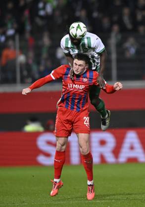 Kopfballduell Zweikampf Aktion Mikkel Kaufmann 1. FC Heidenheim 1846 FCH (29) gegen Stephan Ambrosius FC St. Gallen (05) 1. FC Heidenheim 1846 FCH vs FC St. Gallen 1879 19.12.2024 UEFA Conference League DFL REGULATIONS PROHIBIT ANY USE OF PHOTOGRAPHS AS IMAGE SEQUENCES AND OR QUASI-VIDEO 1. FC Heidenheim 1846 FCH vs FC St. Gallen 1879