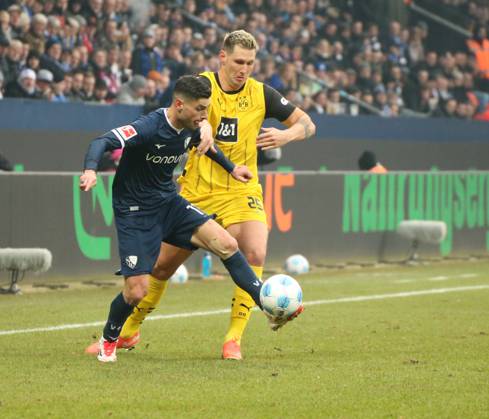 15.02.2025, xgrfx, Fussball 1.Bundesliga, VfL Bochum - Borussia Dortmund v.l. Georgios Masouras (VfL Bochum), Niklas Süle (Borussia Dortmund) (DFL DFB REGULATIONS PROHIBIT ANY USE OF PHOTOGRAPHS as IMAGE SEQUENCES and or QUASI-VIDEO) Bochum