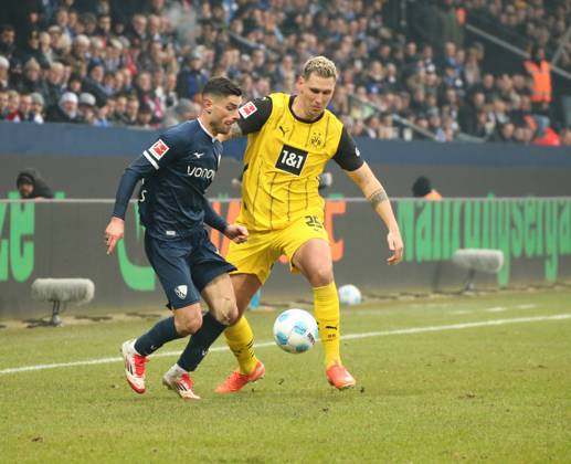 15.02.2025, xgrfx, Fussball 1.Bundesliga, VfL Bochum - Borussia Dortmund v.l. Georgios Masouras (VfL Bochum), Niklas Süle (Borussia Dortmund) (DFL DFB REGULATIONS PROHIBIT ANY USE OF PHOTOGRAPHS as IMAGE SEQUENCES and or QUASI-VIDEO) Bochum