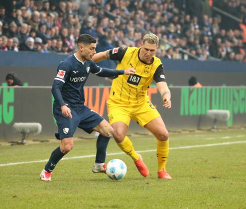 15.02.2025, xgrfx, Fussball 1.Bundesliga, VfL Bochum - Borussia Dortmund v.l. Georgios Masouras (VfL Bochum), Niklas Süle (Borussia Dortmund) (DFL DFB REGULATIONS PROHIBIT ANY USE OF PHOTOGRAPHS as IMAGE SEQUENCES and or QUASI-VIDEO) Bochum