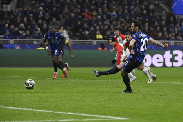 Hakan Calhanoglu of FC Internazionale scores the goal of 2-1 during the UEFA Champions League 2024 2025 round of 16 football match between FC Internazionale and Feyenoord at San Siro stadium in Milano (Italy), March 11, 2025. AndreaxStaccioli