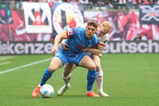 19.04.2025, xgox, Fussball 1. Bundesliga, RB Leipzig - Holstein Kiel emspor, v.l. Nicolai Remberg (Kiel, 22), Nicolas Seiwald (Leipzig, 13) Zweikampf, Duell, Kampf, tackle (DFL DFB REGULATIONS PROHIBIT ANY USE OF PHOTOGRAPHS as IMAGE SEQUENCES and or QUASI-VIDEO) Leipzig