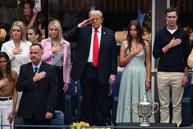President Donald Trump salutes during the National Anthem before watching Jannik Sinner of Italy play Carlos Alcaraz of Spain in the Men s Finals of the 2025 US Open Tennis Championship in Arthur Ashe Stadium at the USTA Billie Jean King National Tennis Center in Flushing Meadows, New York, on Sunday, September 7, 2025.  NYP20250907202 LARRYxMARANO