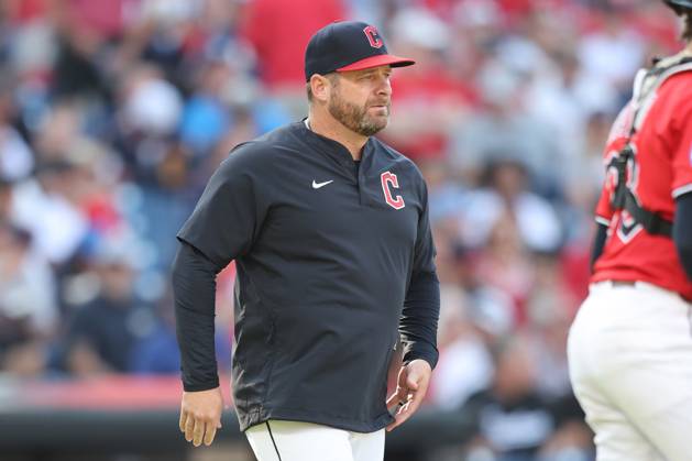 Cleveland Guardians manager Stephen Vogt (12) walks to the pitchers mound in the fifth inning against the Texas Rangers at Progressive Field in Cleveland, Ohio on Sunday, September 28, 2025. CLE20250928112 AARONxJOSEFCZYK