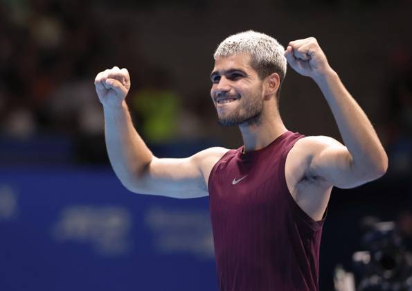 Tennis: Japan Open Carlos Alcaraz of Spain celebrates after beating Taylor Fritz of the United States in the men s singles final at the Japan Open tennis tournament at Ariake Coliseum in Tokyo on Sept. 30, 2025. A14AA0004897120P