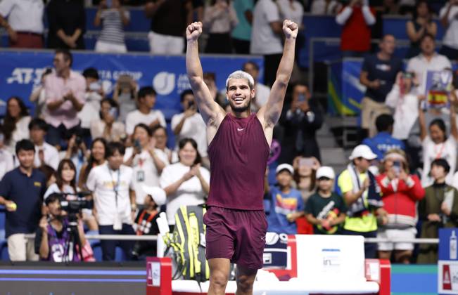 Tennis: Japan Open Carlos Alcaraz of Spain celebrates after beating Taylor Fritz of the United States in the men s singles final at the Japan Open tennis tournament at Ariake Coliseum in Tokyo on Sept. 30, 2025. A14AA0004897121P