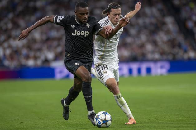 October 22, 2025, Madrid, Madrid, Spain: ALVARO CARRERAS of Real Madrid CF and PIERRE KALULU of Juventus de Turin in action during the match on the third day of the group stage of the 2025 26 UEFA Champions League between REAL MADRID C.F. vs JUVENTUS DE TURIN, played at the Santiago Bernabeu Stadium on October 22, 2025, in Madrid, Spain. Madrid Spain - ZUMAc312 20251022_zsp_c312_049 Copyright: xOscarxManuelxSanchezx