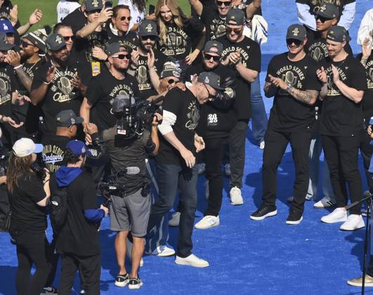 Los Angeles Dodgers first baseman Freddie Freeman celebrates their World Series win with teammates and fans following a parade at Dodger Stadium in Los Angeles on Monday, November 3, 2025. LAP2025110312 JIMxRUYMEN