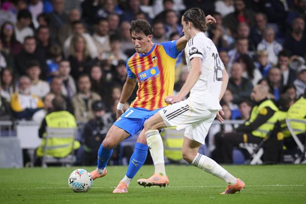 Real Madrid CF™s Alvaro Carreras (R) and Valencia CF™s Jesus Vazquez during La Liga match. November 01 ,2025. (20251101519)