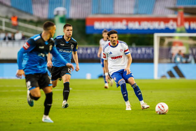 SuperSport HNL, round 15: HNK Hajduk Split v NK Varazdin Aleksa Latkovic of NK Varazdin and Filip Krovinovic of HNK Hajduk Split during the SuperSport HNL 2025. 2026. round 15 match between HNK Hajduk Split and NK Varazdin at Poljud Stadium in Split, Croatia on November 29, 2025. ZvonimirxBarisin PIXSELL