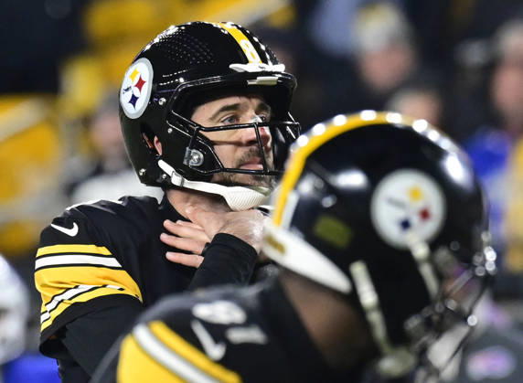 Pittsburgh Steelers quarterback Aaron Rodgers (8) signals to his offense during the fourth quarter of the Buffalo Bills 26-7 win with a bandage on his nose at Acrisure Stadium Sunday, November 30, 2025 in Pittsburgh.  PIT2025113020 ARCHIExCARPENTER