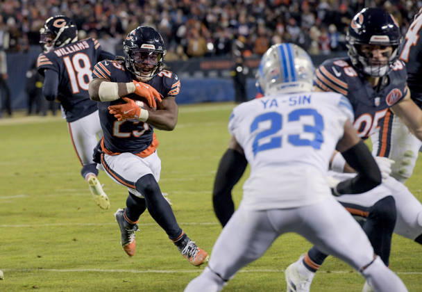 Chicago Bears running back Kyle Monangai (25) runs the ball in for the 2 point conversion in the fourth quarter against the Detroit Lions at Soldier Field in Chicago on Sunday, January 4, 2026. The Lion defeated the Bears 19-16. CHI20260104118 MARKxBLACK