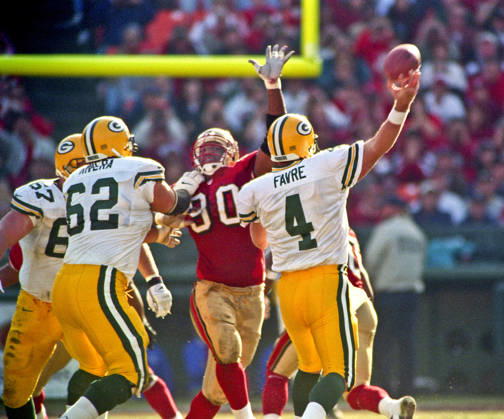 January 3, 1999 - San Francisco, California, U.S - San Francisco 49ers vs. Green Bay Packers Candlestick Park Sunday, January 3, 1999. 49ers beat Packers 30-27. San Francisco 49ers defensive tackle Junior Bryant (90) rushes Green Bay Packers quarterback Brett Favre Copyright: xAlxGolubx