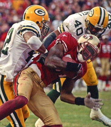 January 3, 1999 - San Francisco, California, U.S - San Francisco 49ers vs. Green Bay Packers Candlestick Park Sunday, January 3, 1999. 49ers beat Packers 30-27. Green Bay Packers defensive back Darren Sharper (42) and defensive back Pat Terrell (40 hit San Francisco 49ers wide receiver Terrell Owens (81) at goal line. Copyright: xAlxGolubx