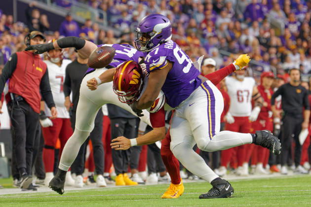 NFL, American Football Herren, USA Washington Commanders at Minnesota Vikings Minnesota Vikings Nose Tackle Javon Hargrave (97) tackled Washington Commanders Quarterback Jayden Daniels (5) and forces fumble during the NFL regular season game at US Bank Stadium in Minneapolis Minnesota on December 7, 2025. The Minnesota Vikings defeated the Washington Commanders 31-0 (Jeff Scudder Image of Minneapolis Minnesota United States EDITORIAL USE ONLY Copyright: x xJeffxScudderx JeffxScudderx iosphotos388345